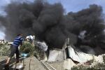 С облаци от дим осъмна град Газа