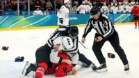 Жесток бой помрачи олимпийски хокеен мач (ВИДЕО)