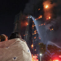 Броят на жертвите от ожесточения пожар в Хонконг се увеличи до 55 (СНИМКИ)