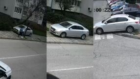 Камера улавя опасно шофиране: Кола се разминава с пешеходка с куче по тротоара
