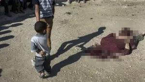 Видео показва как сирийски бунтовници обезглавяват проправителствен боец