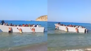 Туристи се опитали сами да спрат лодка с мигранти да акостира на брега на гръцки остров