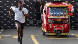 Юсеин Болт в дуел с... такси (ВИДЕО)